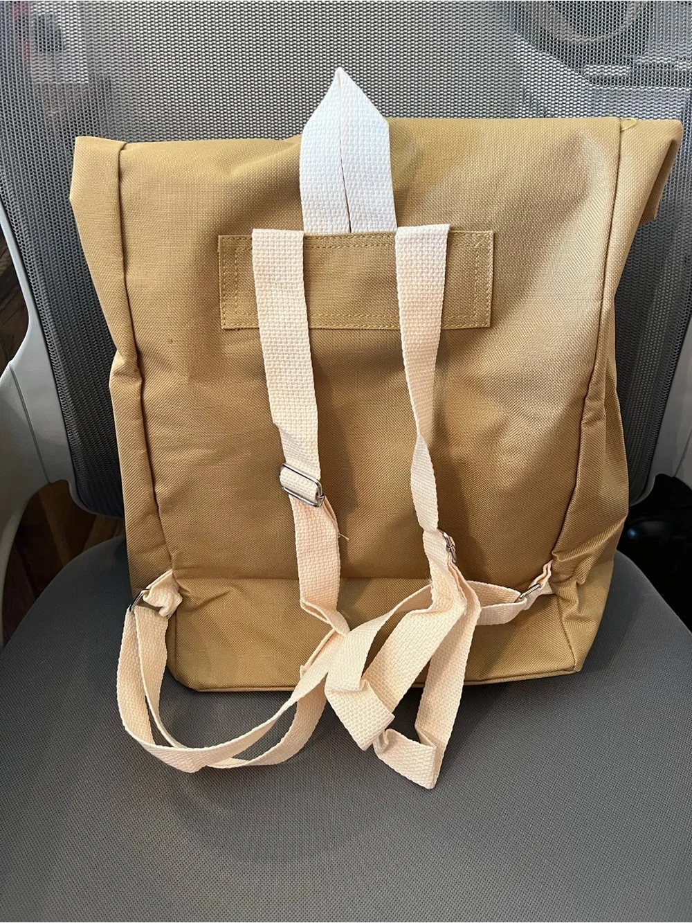 McDonald's Brown and Yellow Roll-Top backpack .